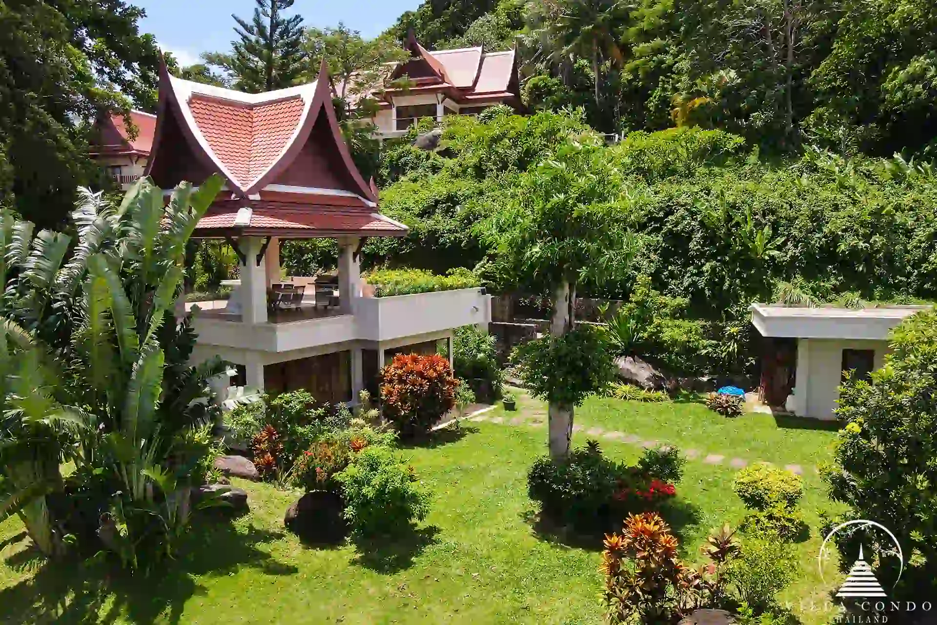 Exterior of Nakathani Villa Estate Kamala Beach with a private garden area.