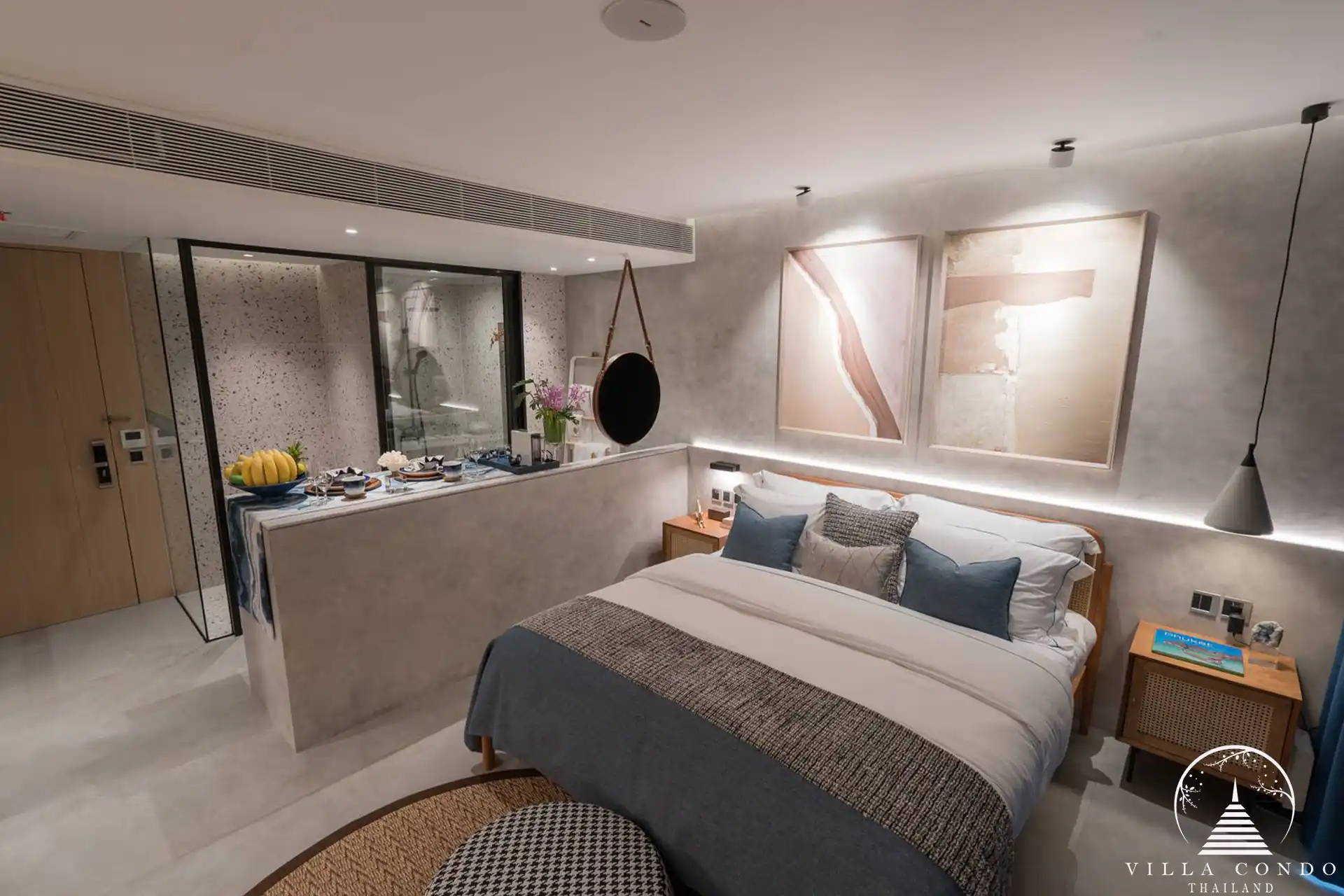 Guest bedroom at Sunshine Beach Beachfront Resort & Residences with stylish decor and garden views.