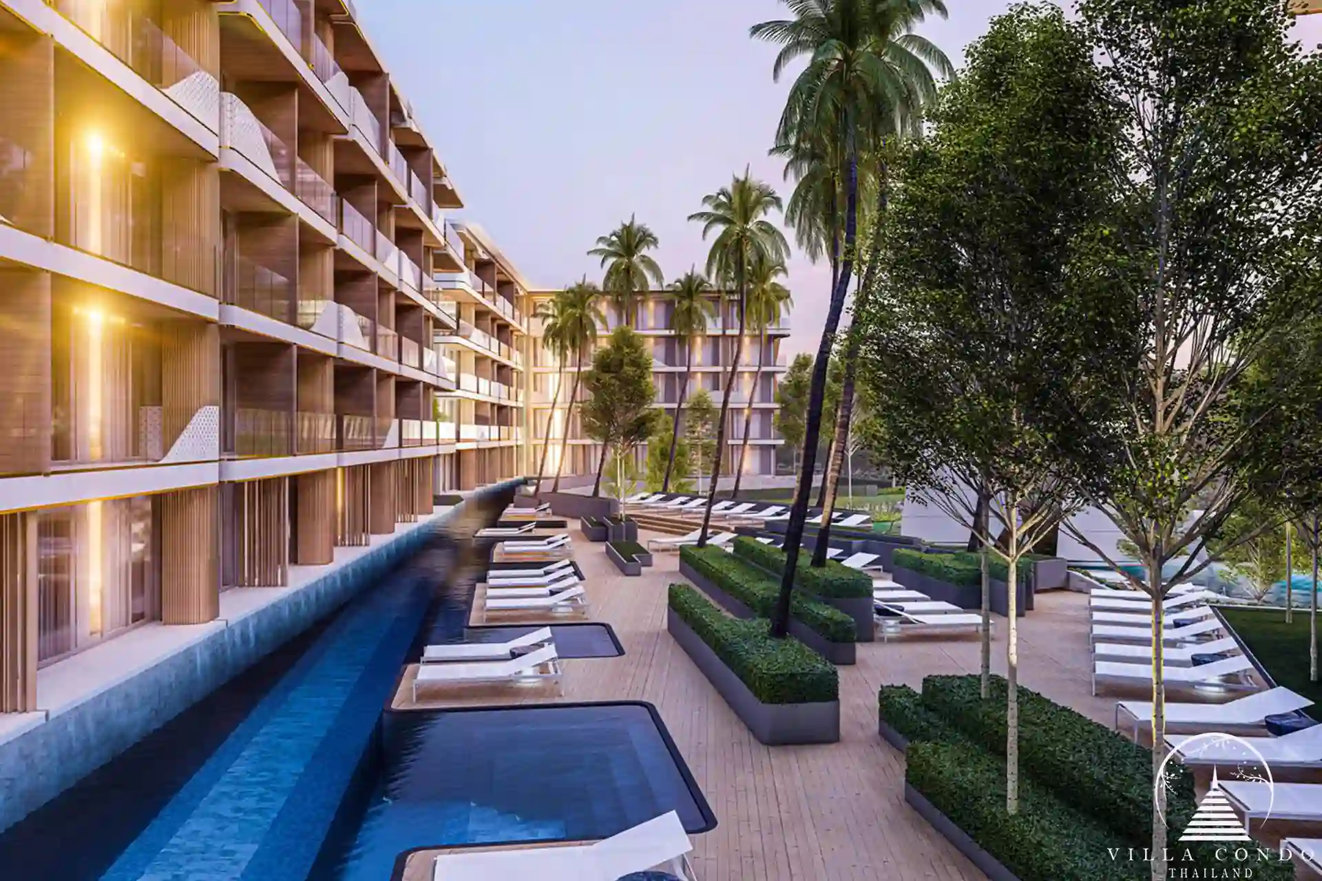 Common pool with sunbeds at Sunshine Beach Beachfront Resort & Residences.