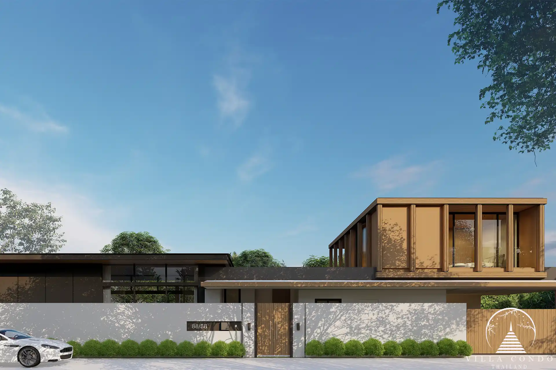 Elegant entrance of The Baya Villas with modern design and tropical landscaping.