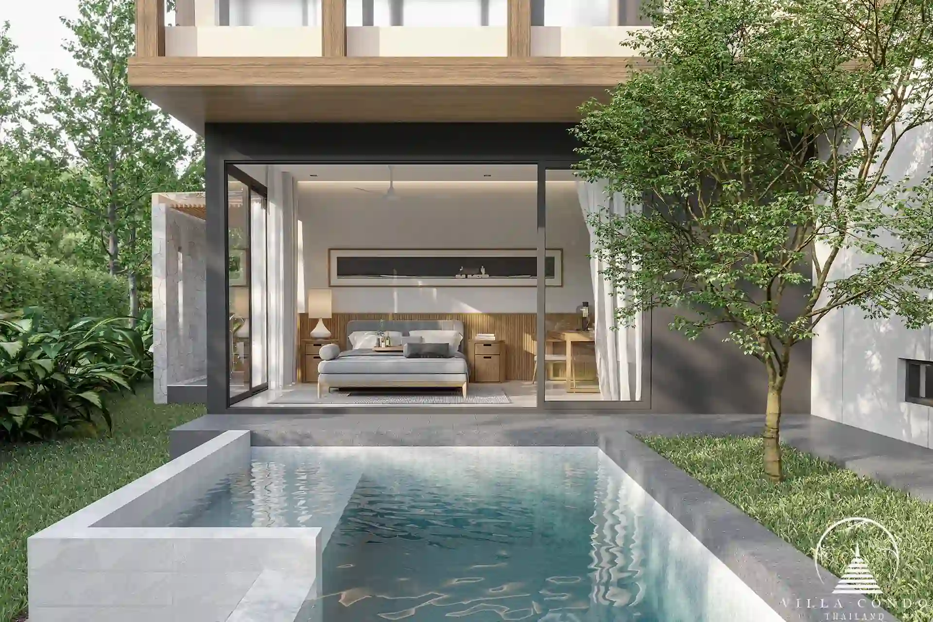 Private swimming pool surrounded by tropical greenery at The Baya Villas.