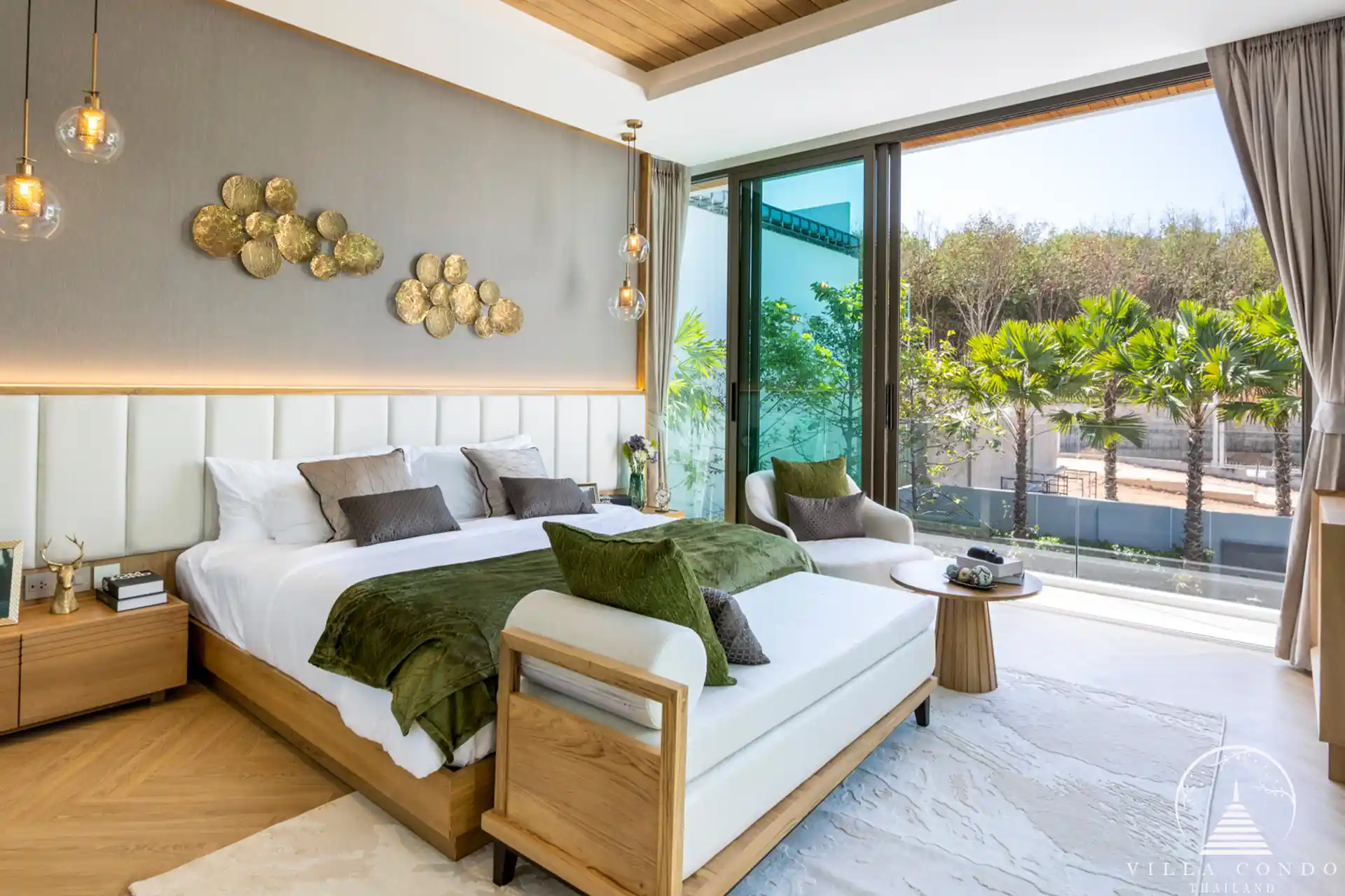 Cozy bedroom in The Teak Phuket with modern furnishings and natural lighting