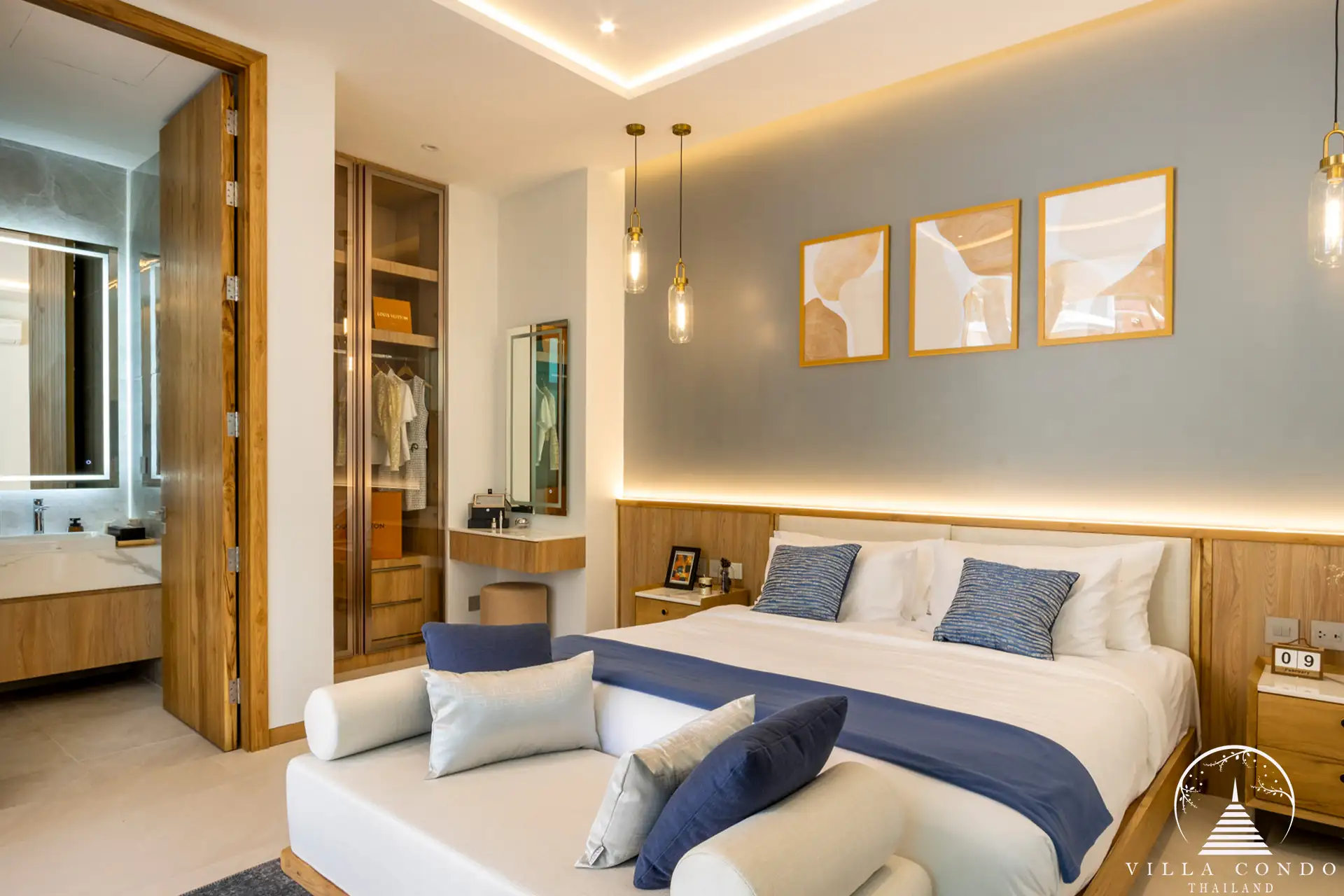 Spacious master bedroom with modern furnishings at The Teak Phuket