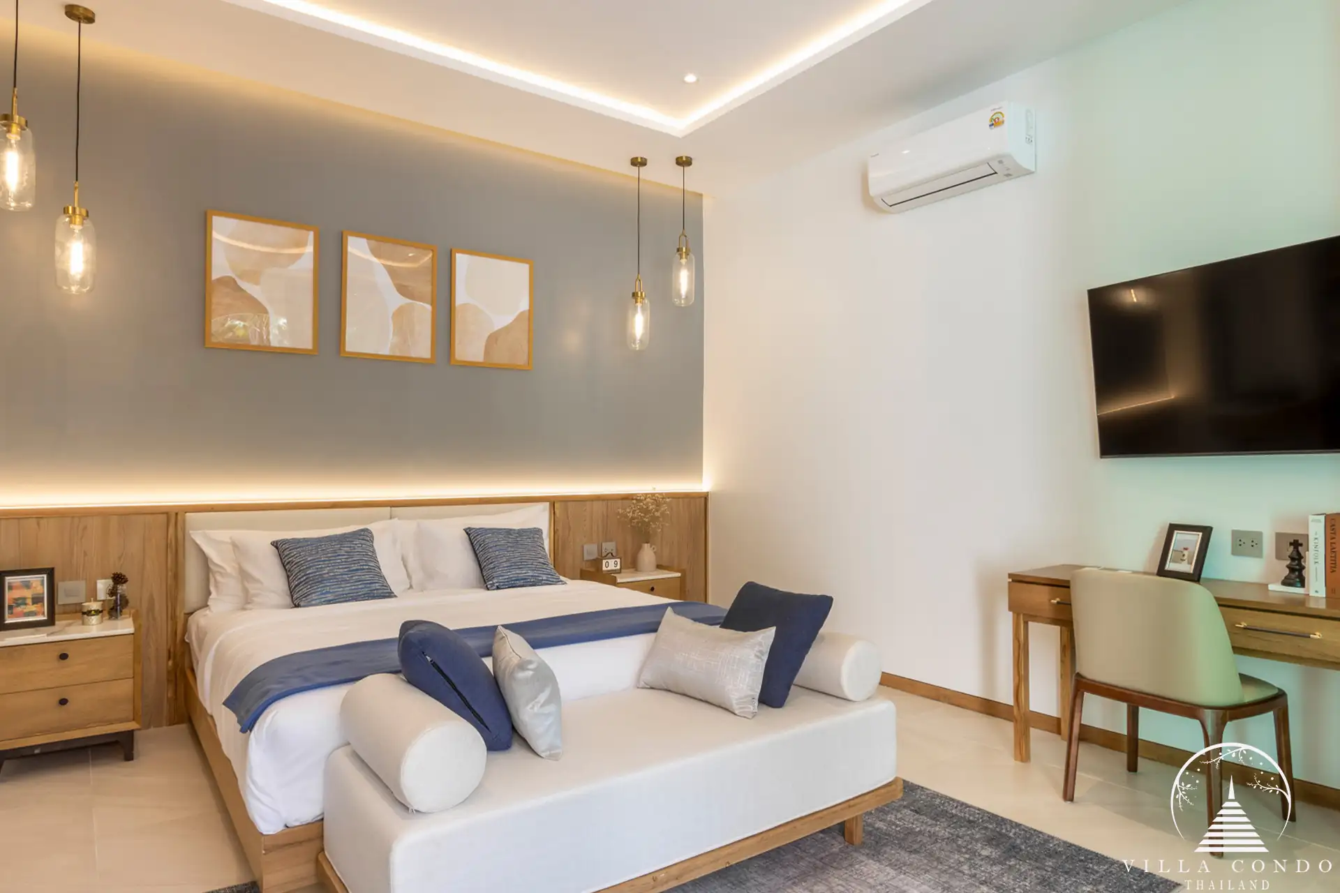 Spacious master bedroom with modern furnishings at The Teak Phuket