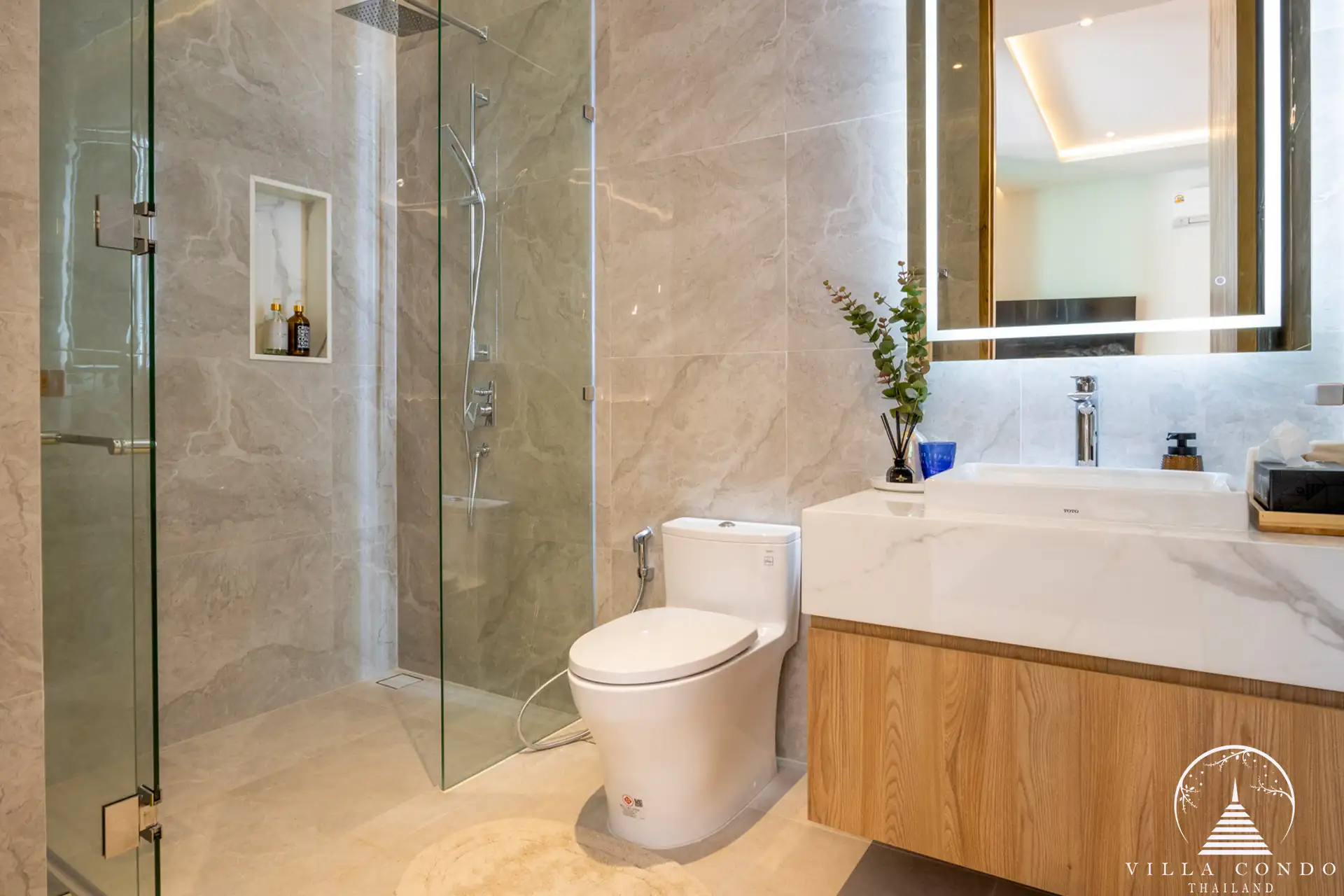 Spacious bathroom with high-end fixtures at The Teak Phuket