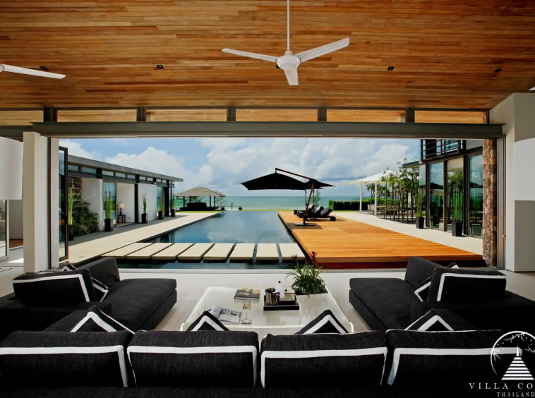 Luxurious interior of Villa Essenza Natai Beach Front with open-plan living space.