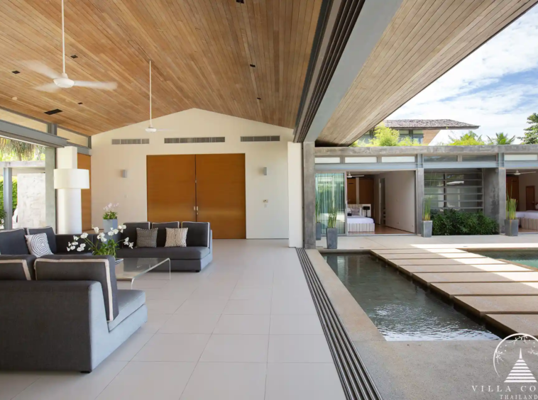 Luxurious interior of Villa Essenza Natai Beach Front with open-plan living space.