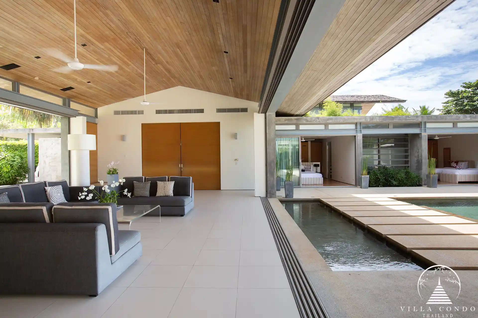 Luxurious interior of Villa Essenza Natai Beach Front with open-plan living space.