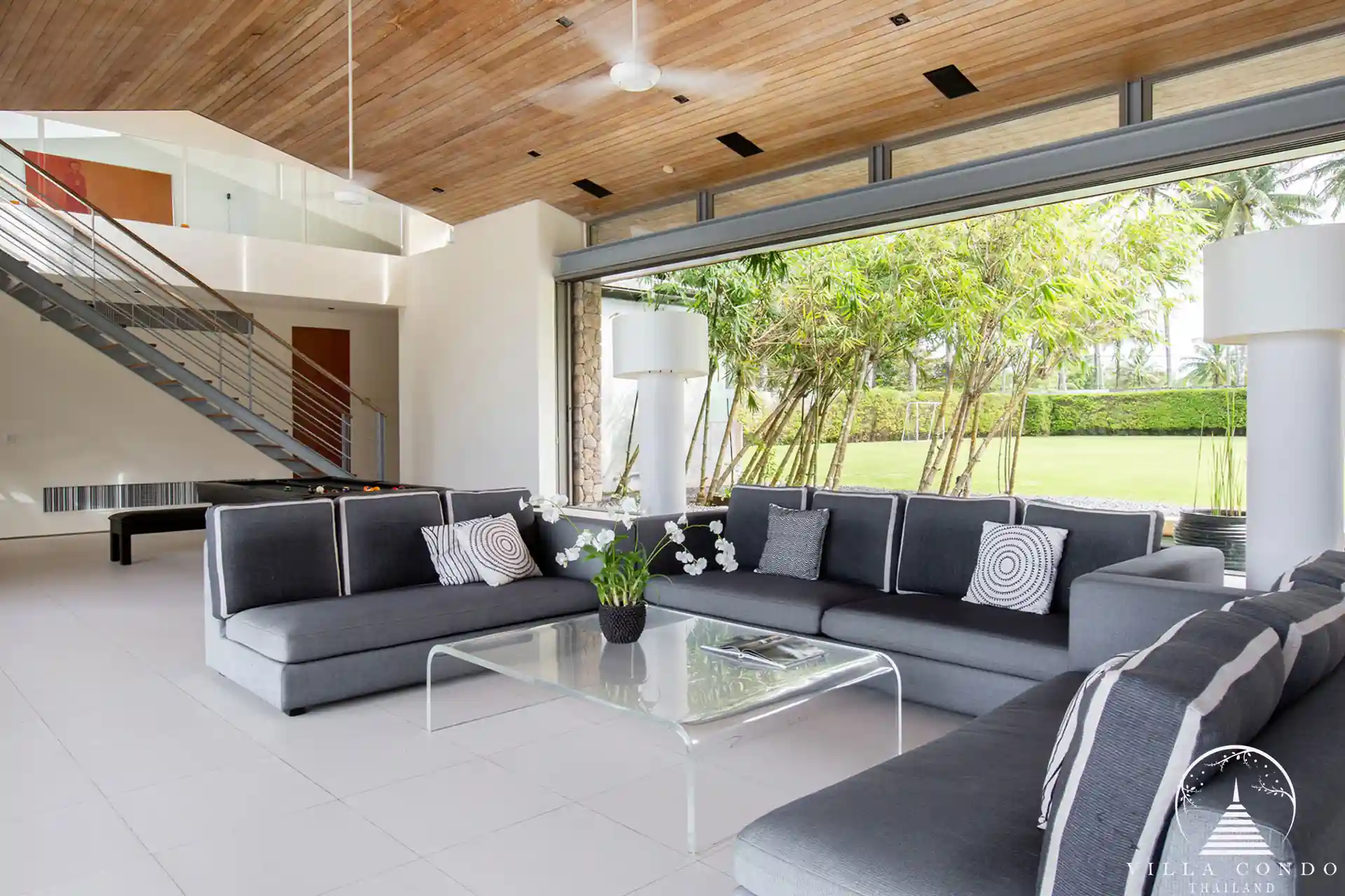 Spacious living area at Villa Essenza Natai Beach Front with pool and sea views.