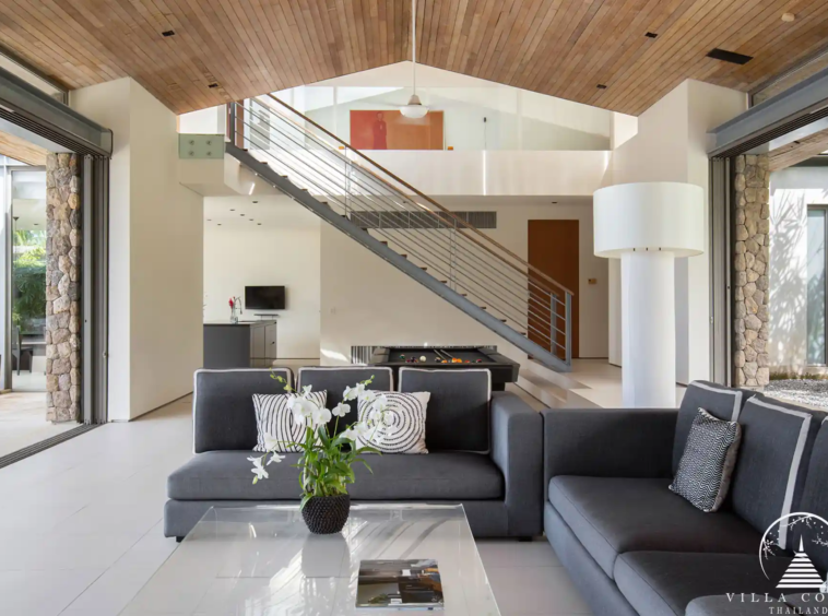Luxurious interior of Villa Essenza Natai Beach Front with open-plan living space.