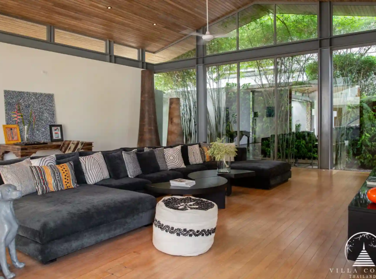 Spacious living area at Villa Essenza Natai Beach Front with pool and sea views.