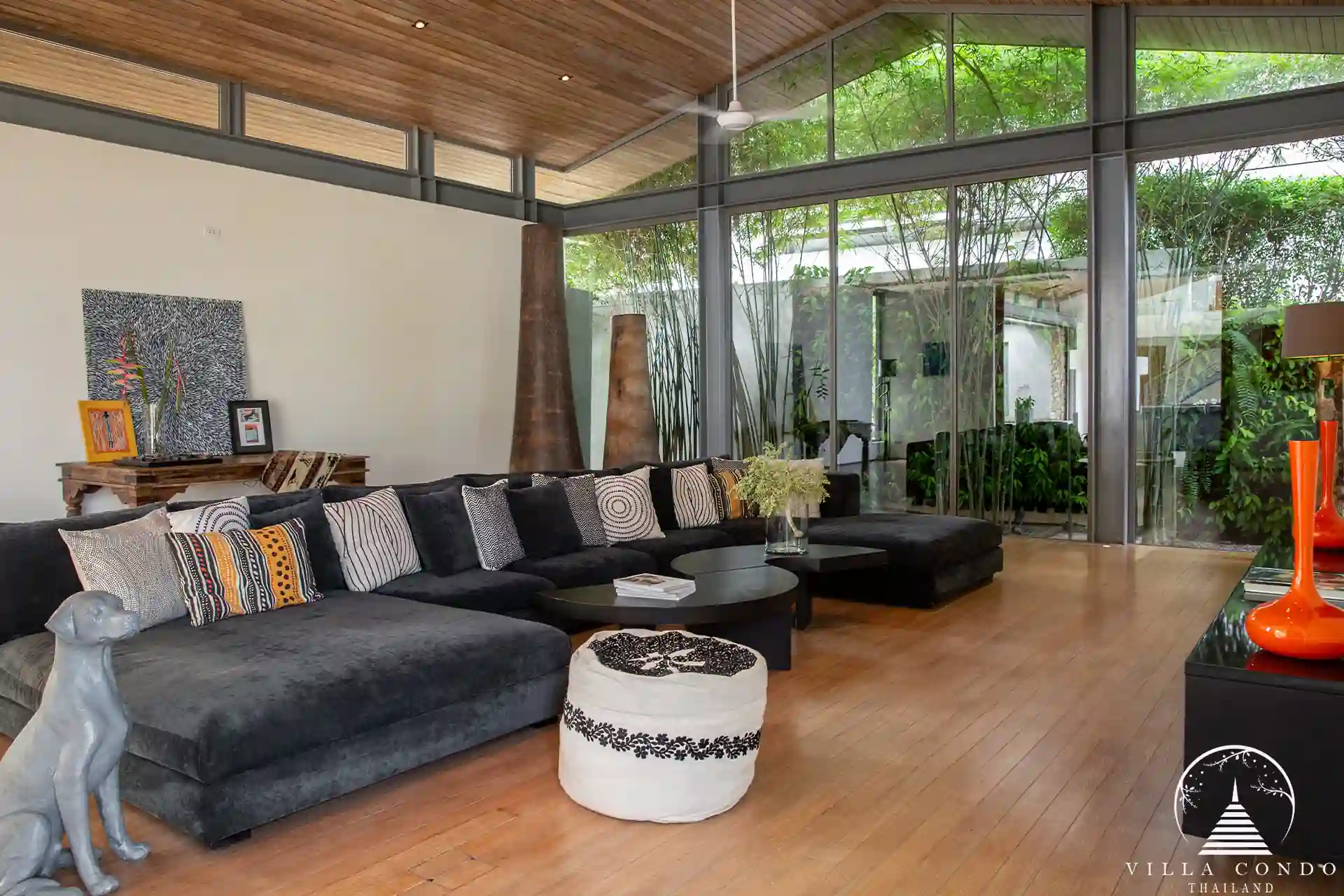 Spacious living area at Villa Essenza Natai Beach Front with pool and sea views.