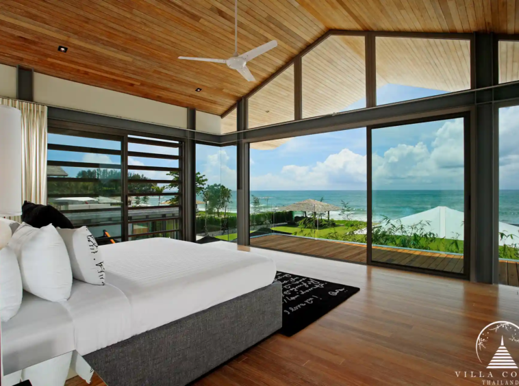 Luxurious master bedroom at Villa Essenza Natai Beach Front with panoramic sea views.