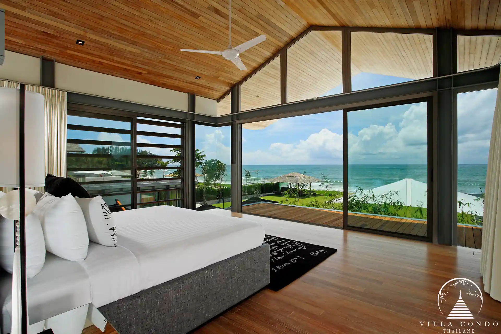 Luxurious master bedroom at Villa Essenza Natai Beach Front with panoramic sea views.