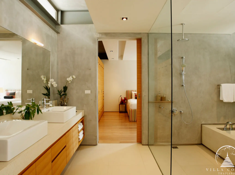 Spacious master bathroom at Villa Essenza Natai Beach Front with luxury finishes and ocean views.