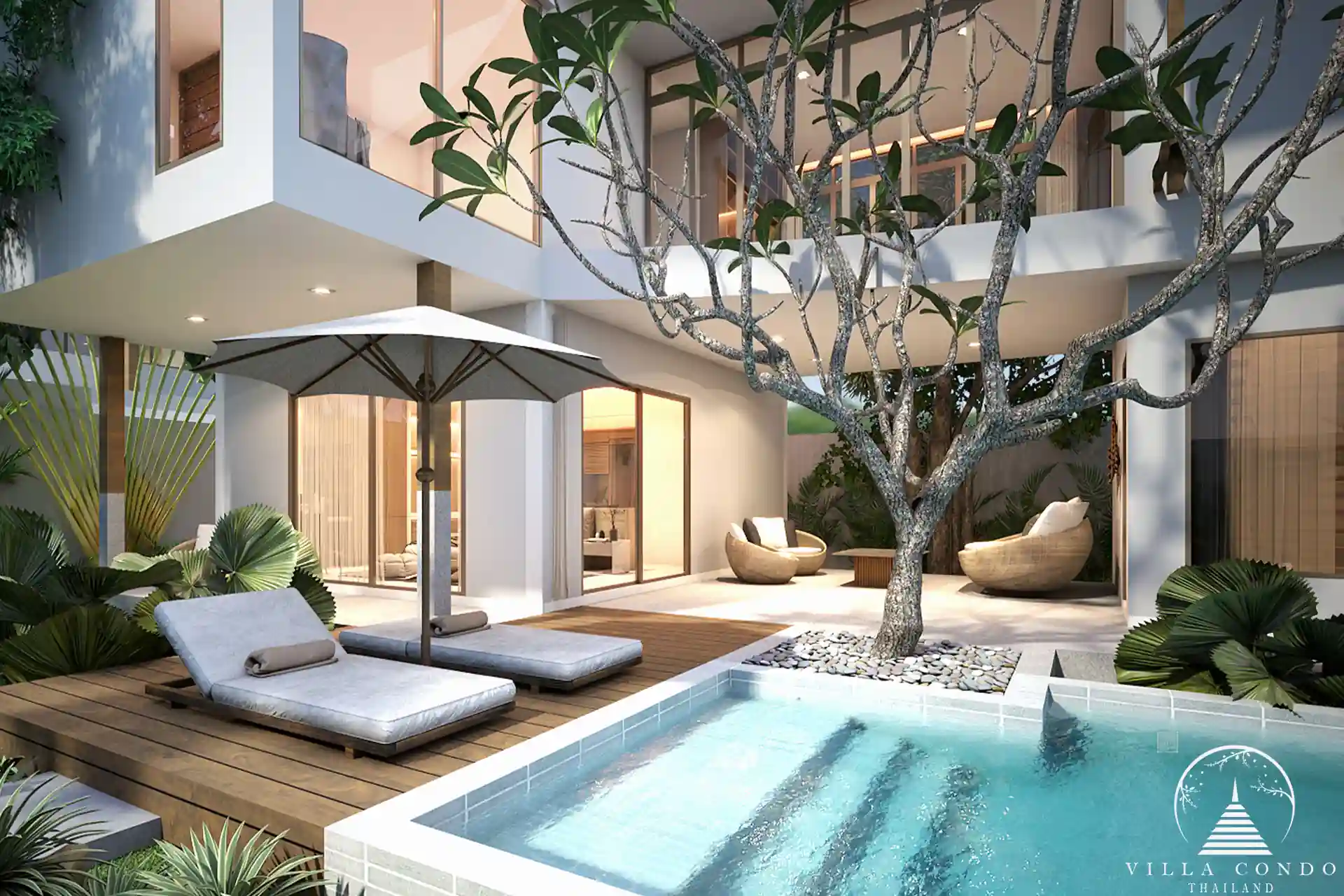 Private pool with sunbeds at Vinzita Elite Residences, surrounded by tropical greenery.