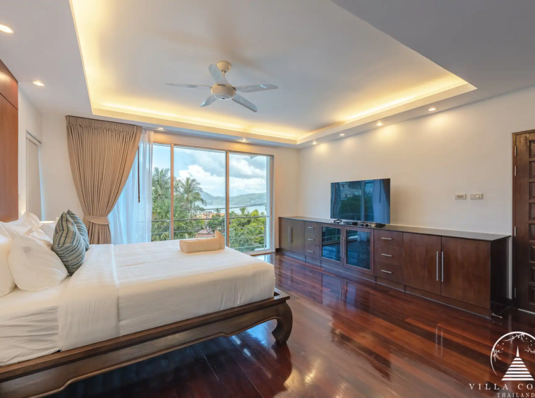 White Villa Patong master bedroom with ensuite and balcony with sea view.