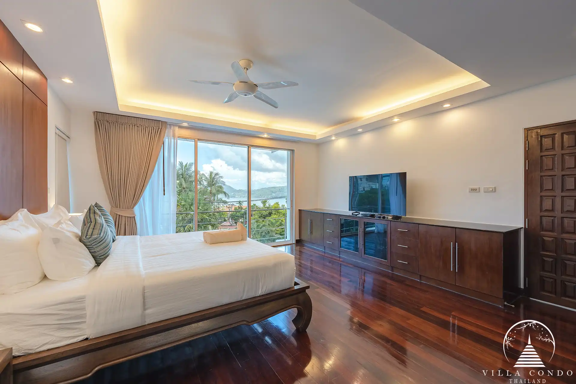 White Villa Patong master bedroom with ensuite and balcony with sea view.