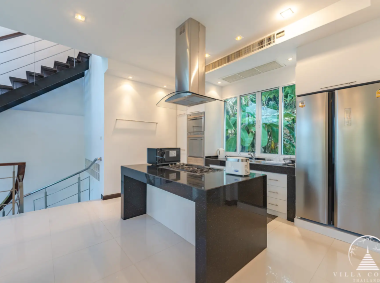 White Villa Patong fully equipped modern kitchen with sea view.