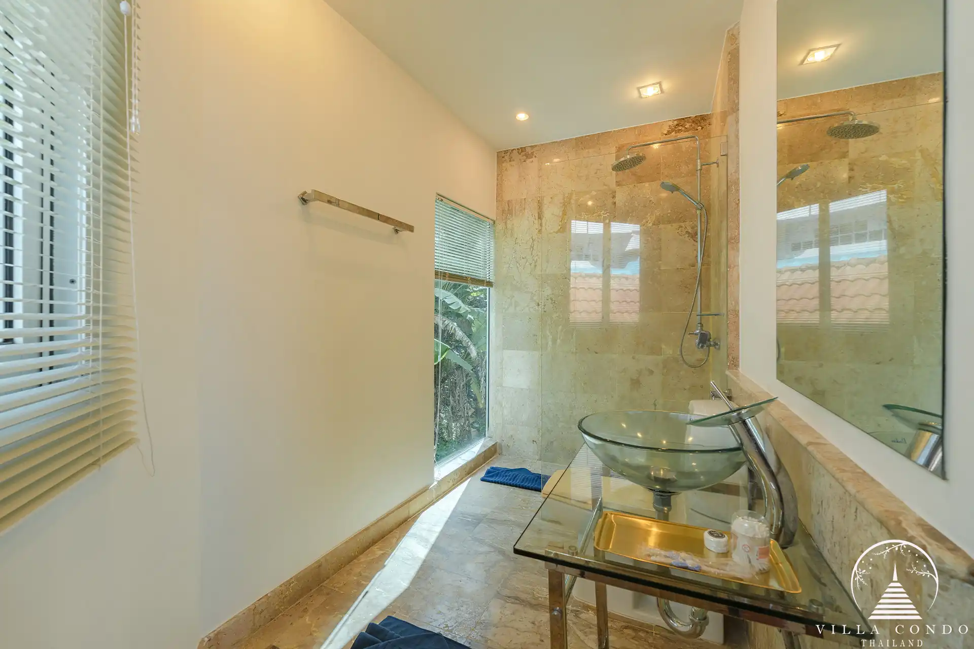 Modern guest bathroom in White Villa Patong with elegant fixtures and spacious design.