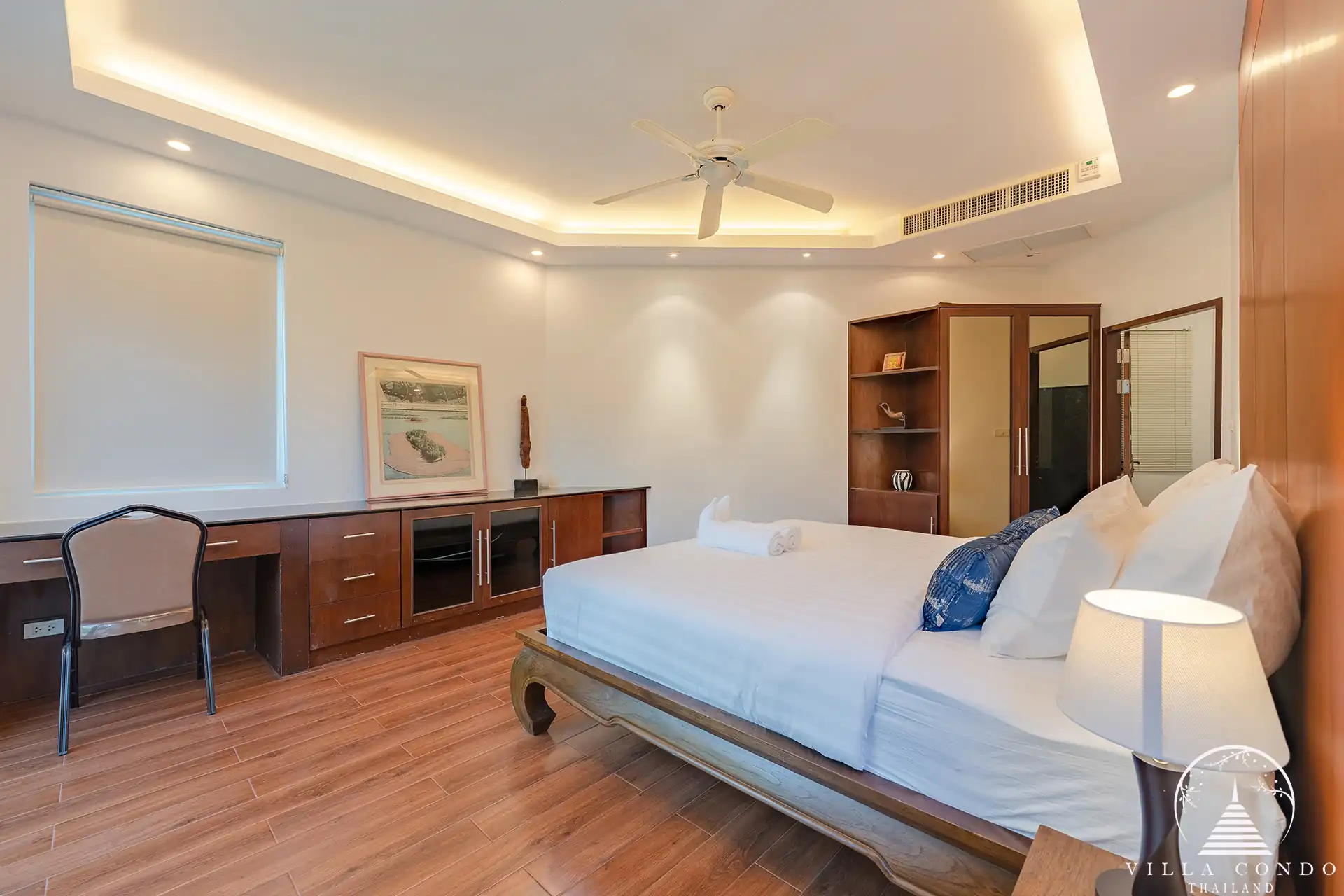 Second bedroom in White Villa Patong with modern décor and private balcony.