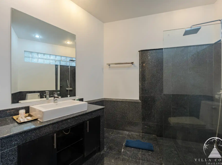 Stylish second bathroom in White Villa Patong with modern fixtures and spacious shower area.