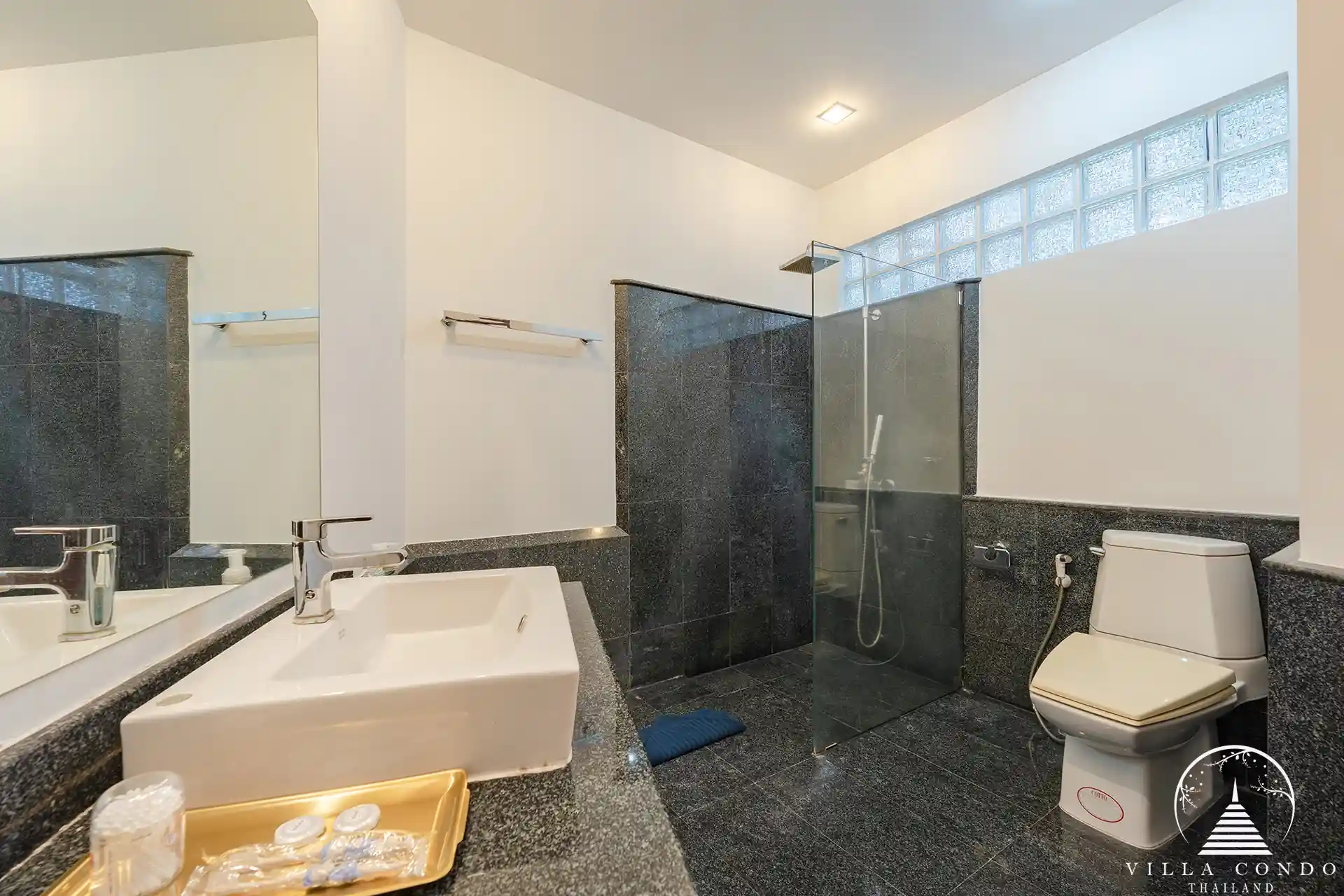 White Villa Patong luxury bathroom with jacuzzi and modern fixtures.