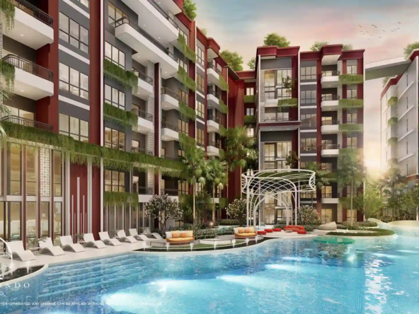 The beautiful swimming pool at The Title Artrio Bangtao surrounded by lush greenery.