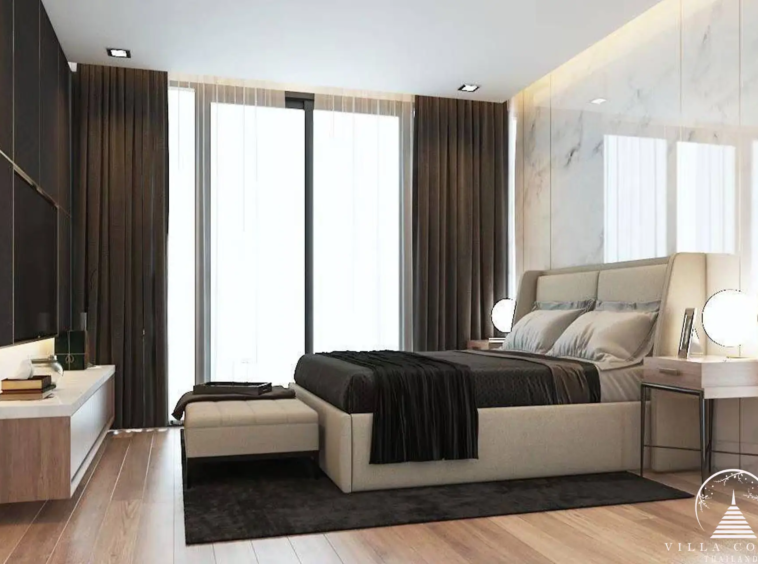 Master bedroom at Goldena Pool Villas with private balcony.