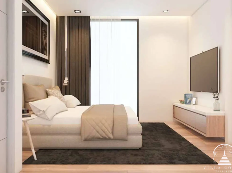 Bedroom in Goldena Pool Villas with balcony access.