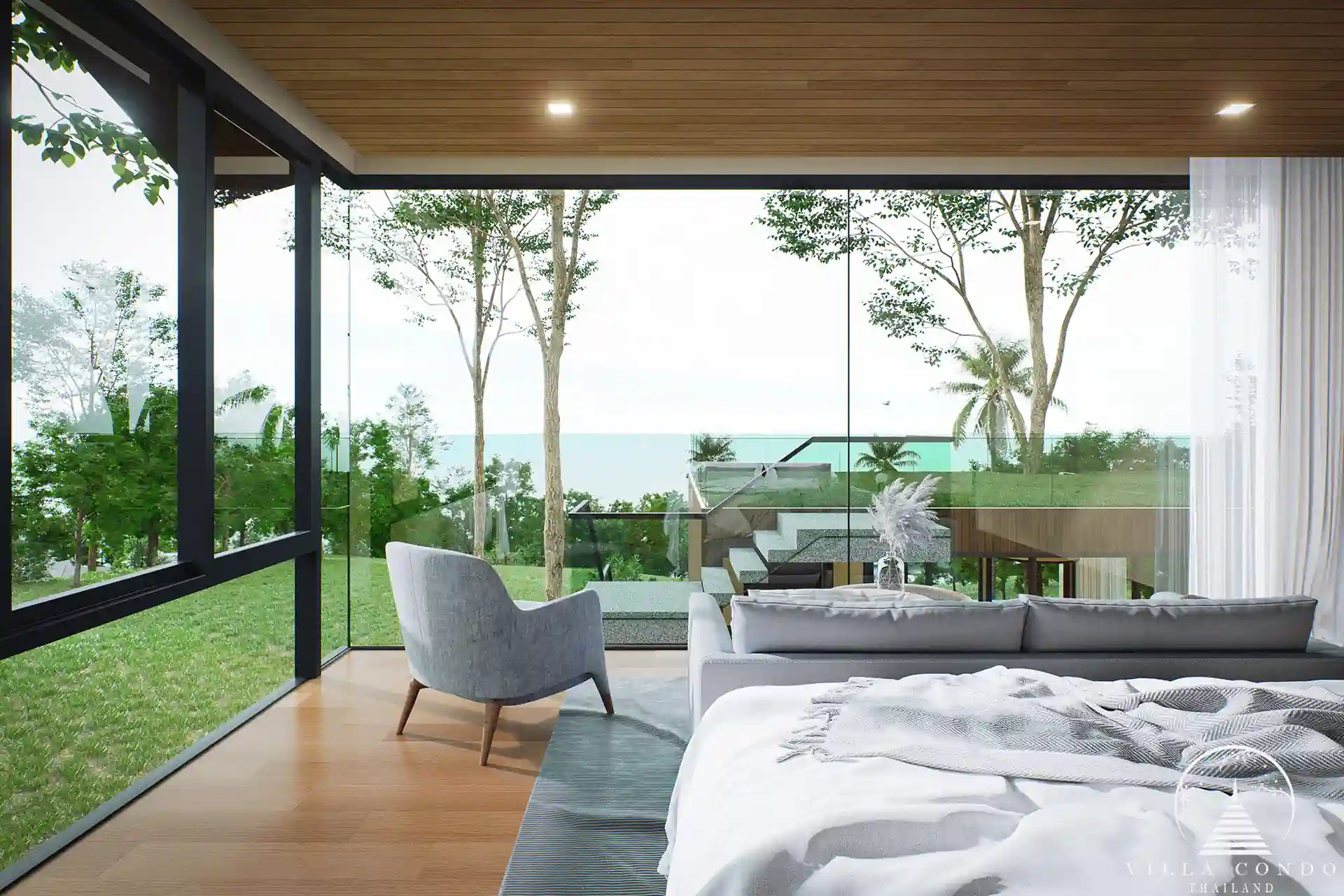 Spacious master bedroom with ocean views at Sinae Residence