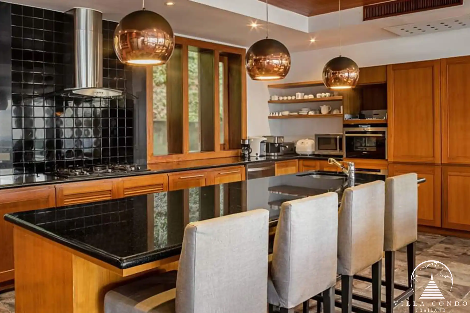 Bar and pantry area at Villa Yang Som with elegant countertops and premium appliances