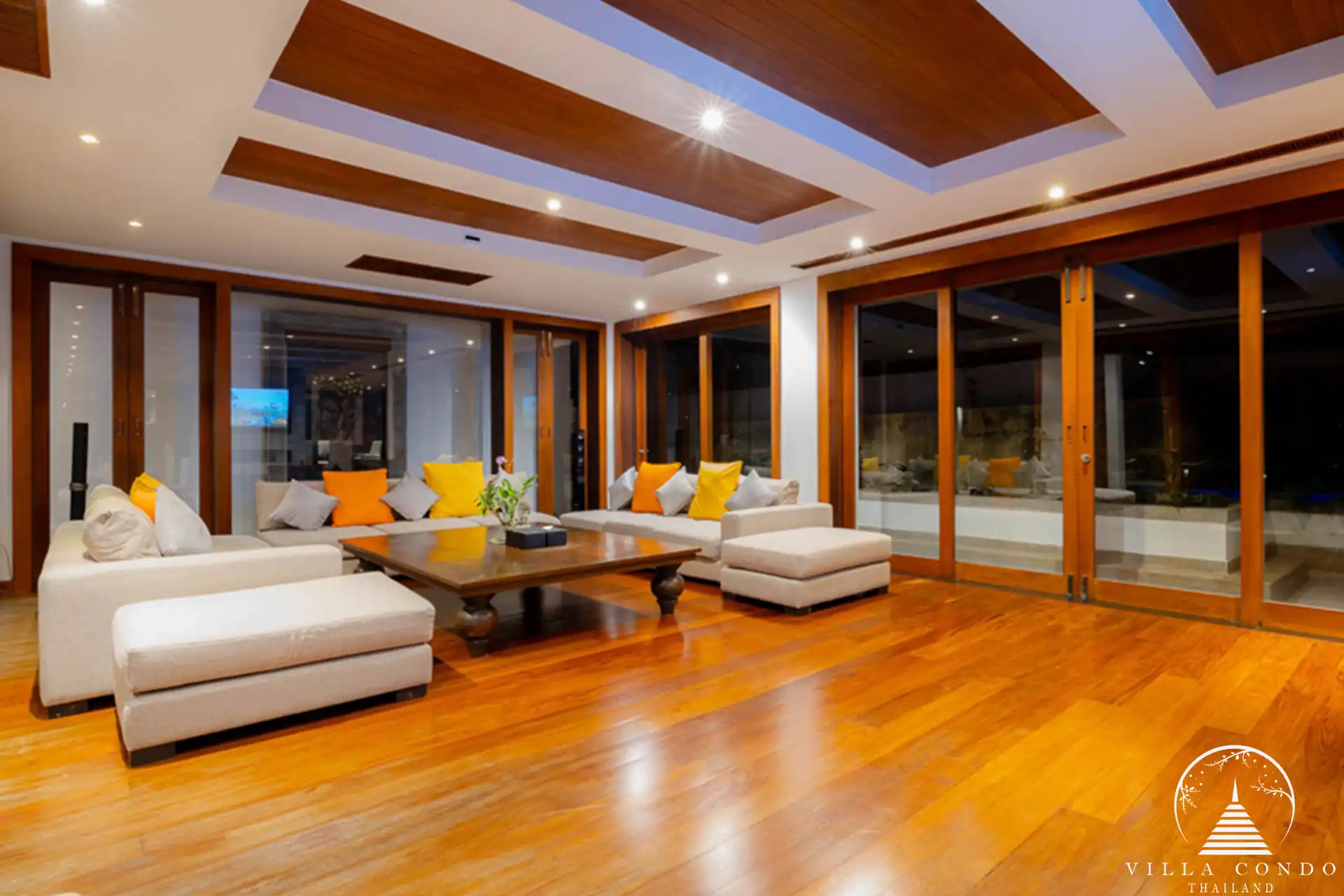 Open-plan living area at Villa Yang Som with panoramic sea views and modern furnishings
