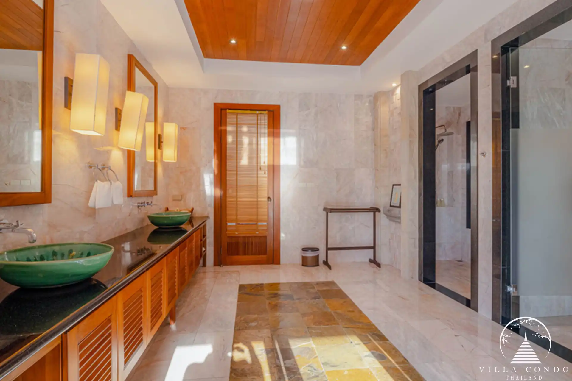 Spacious master bathroom at Villa Yang Som with modern amenities and a sea-view Jacuzzi