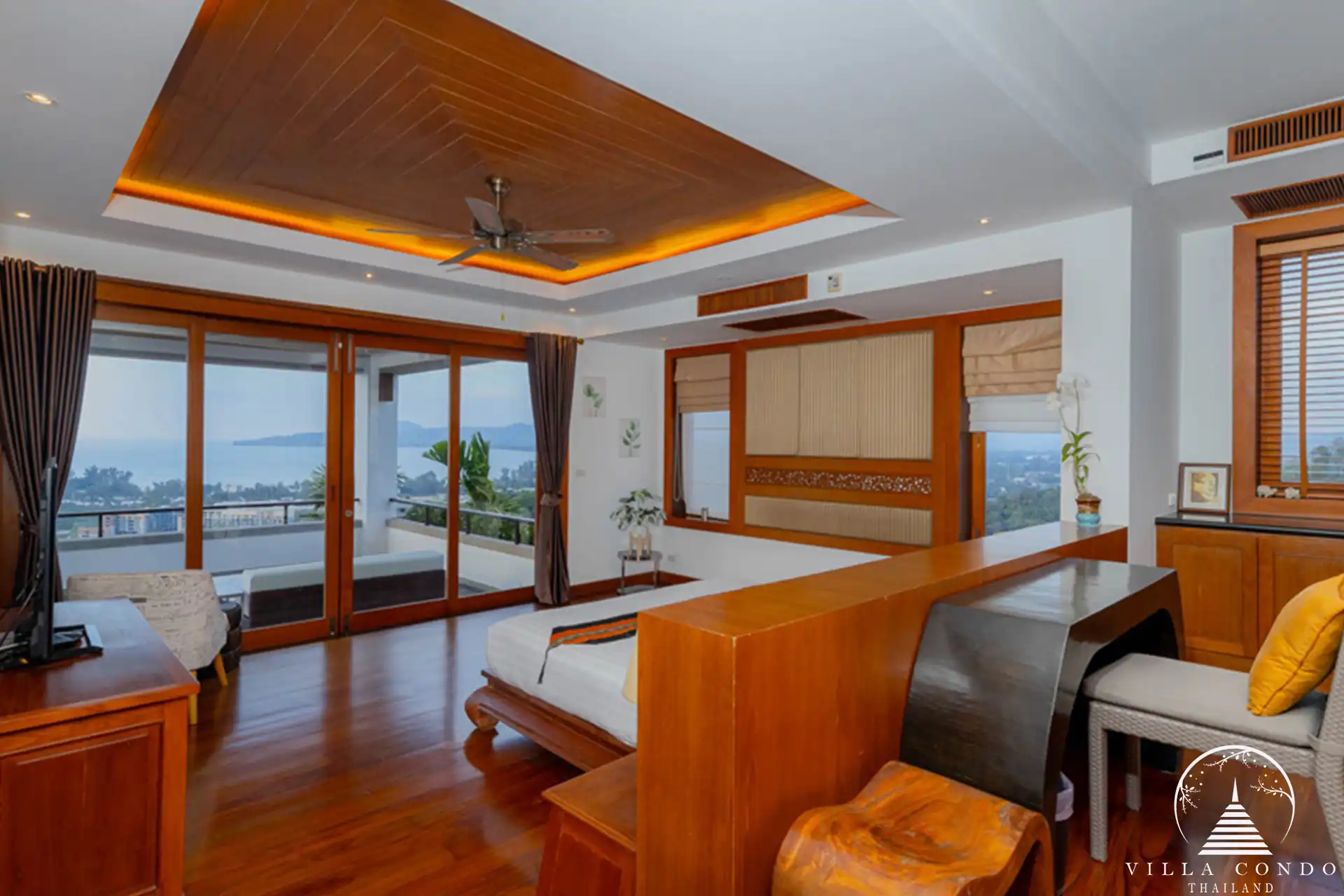 Luxurious master bedroom at Villa Yang Som with panoramic ocean views and elegant design