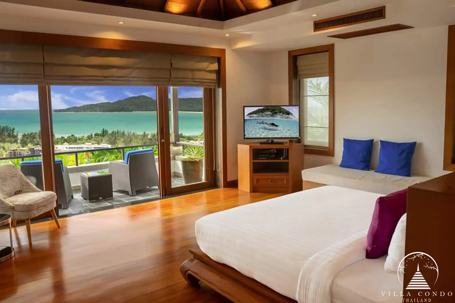 Spacious ocean-view bedroom at Villa Yang Som with private balcony