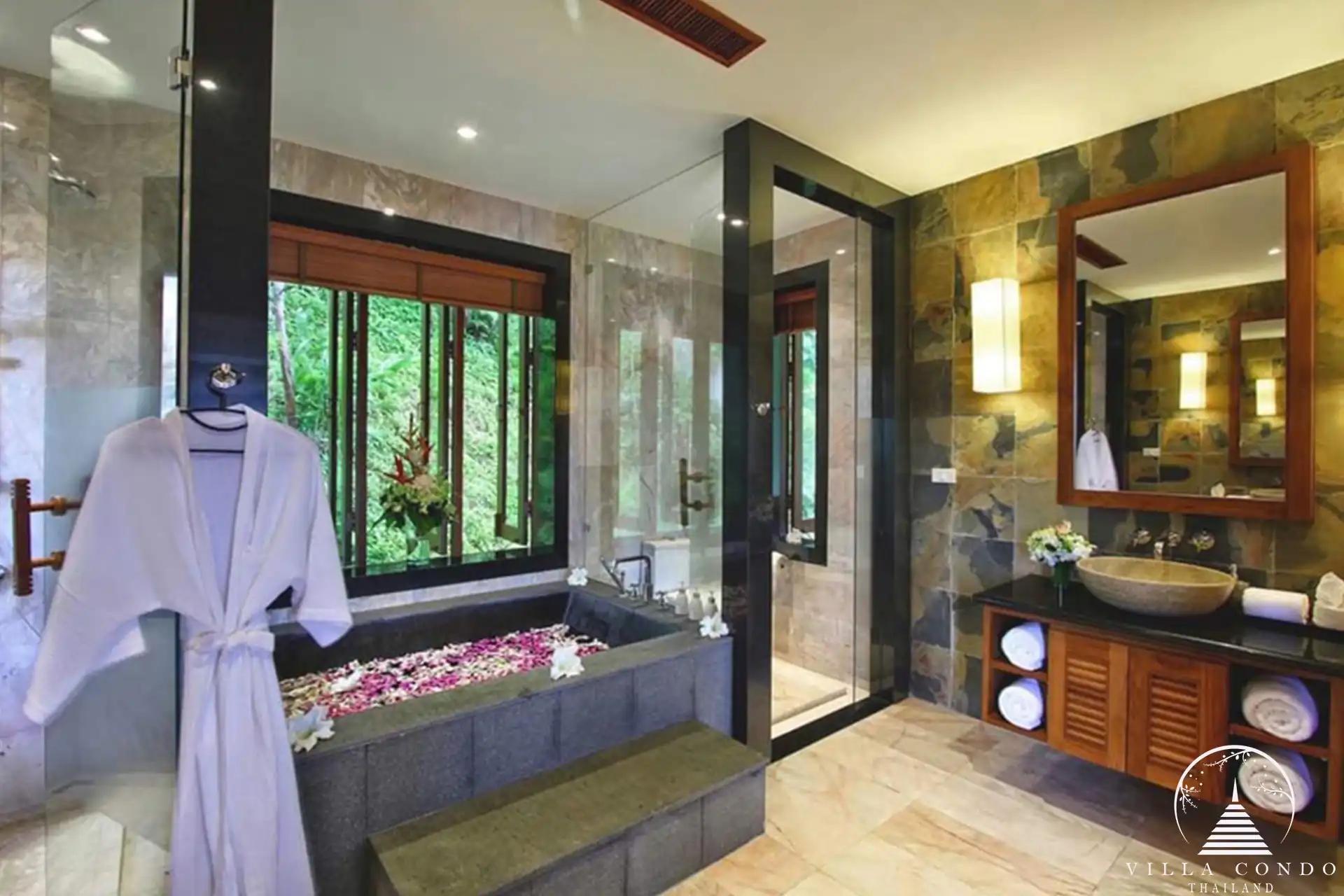 Spacious master bathroom at Villa Yang Som with modern amenities and a sea-view Jacuzzi