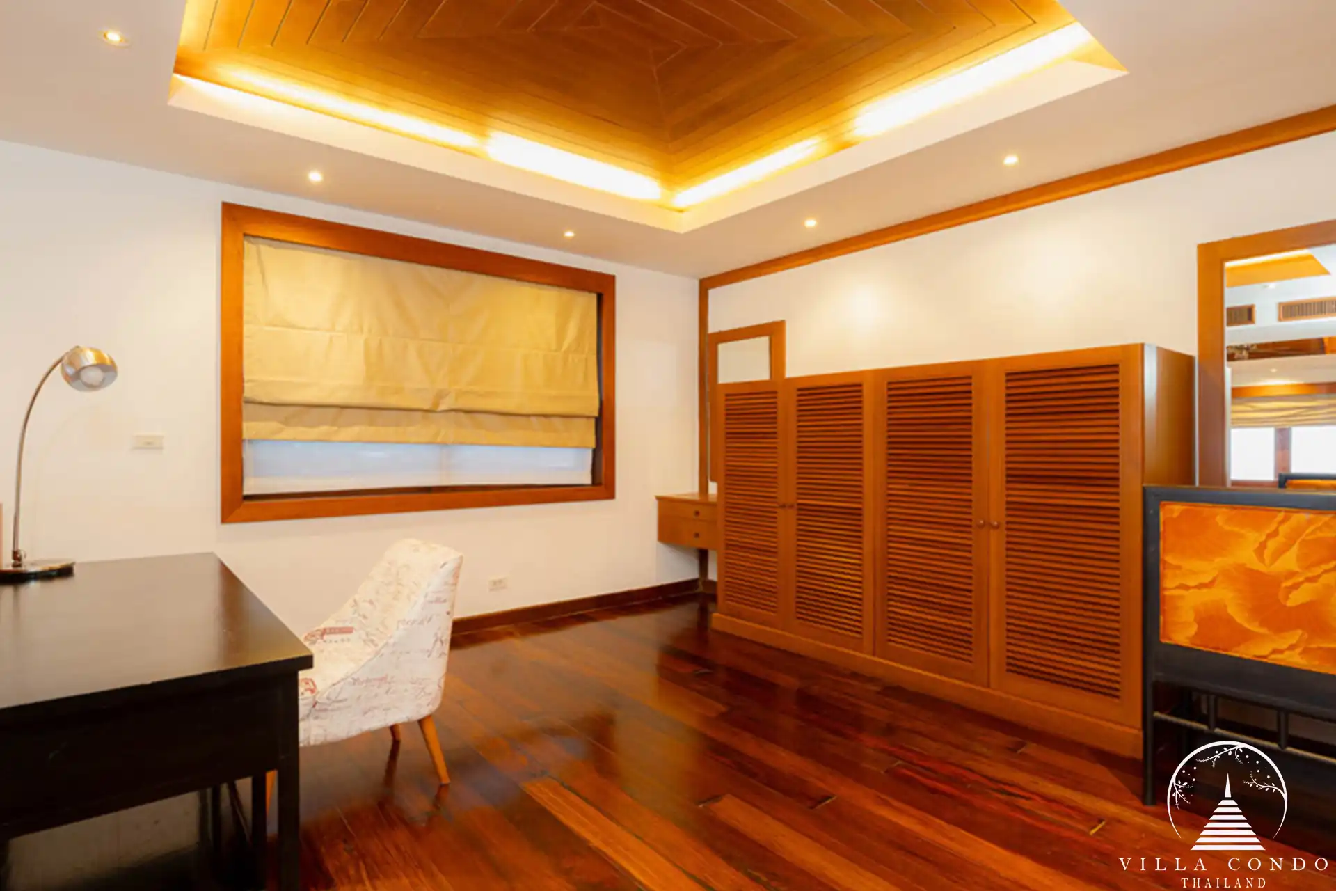 Elegant interior of Villa Yang Som with modern furnishings and floor-to-ceiling windows