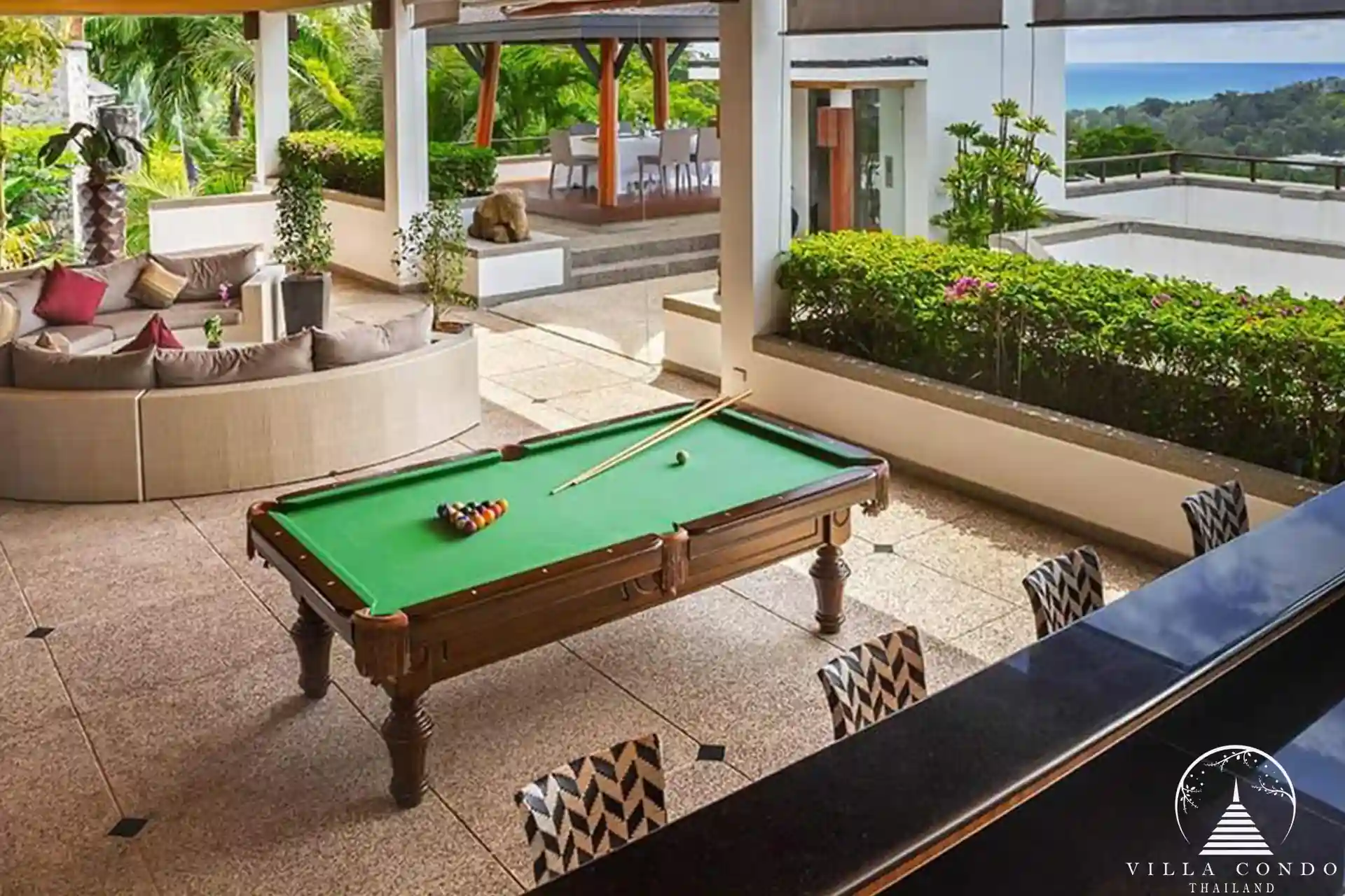 Expansive outdoor area at Villa Yang Som with tropical gardens and ocean views