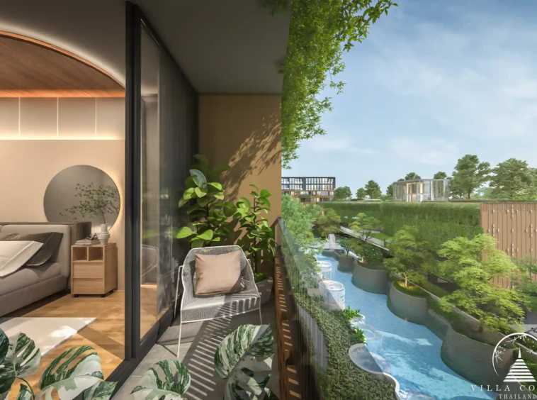 Arise Vibe Condo bedroom with balcony overlooking pool and garden in Thalang Phuket