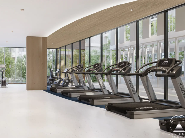 Arise Vibe Condo cardio fitness area with treadmills and glass windows in Thalang Phuket