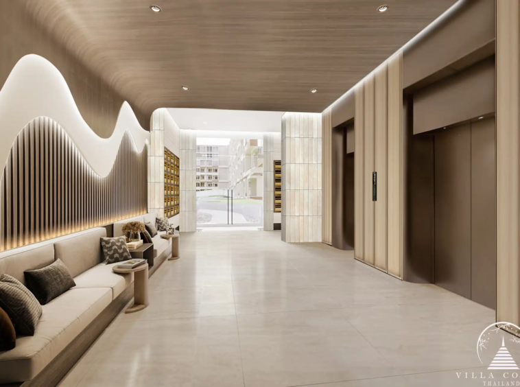 Arise Vibe Condo elevator lobby with seating and wall decor in Thalang Phuket
