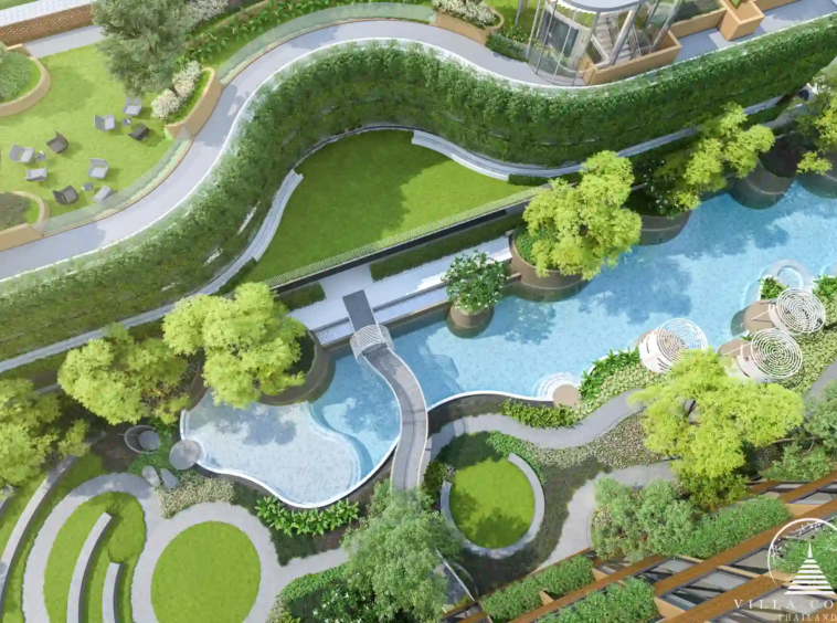Arise Vibe condo garden walkway with curved pool in Thalang Phuket