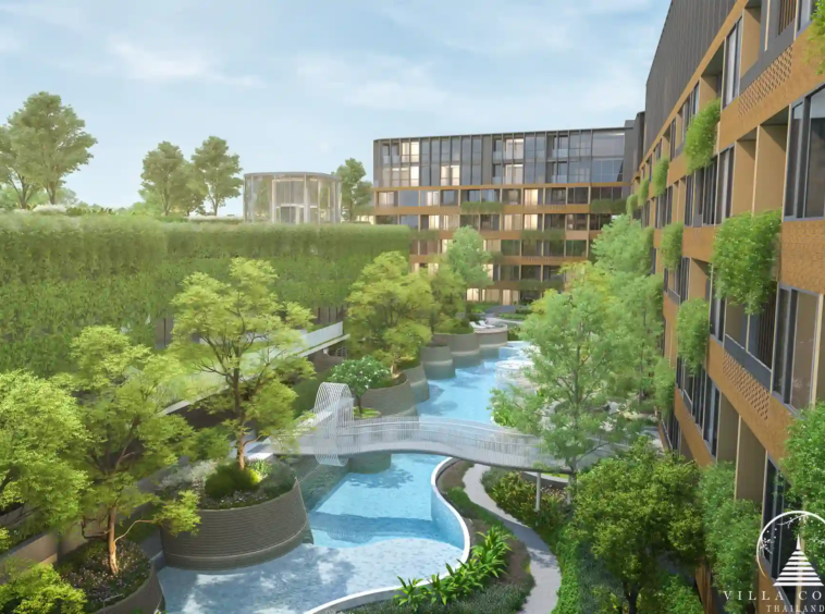 Arise Vibe condo pool area with scenic bridge and greenery in Thalang Phuket