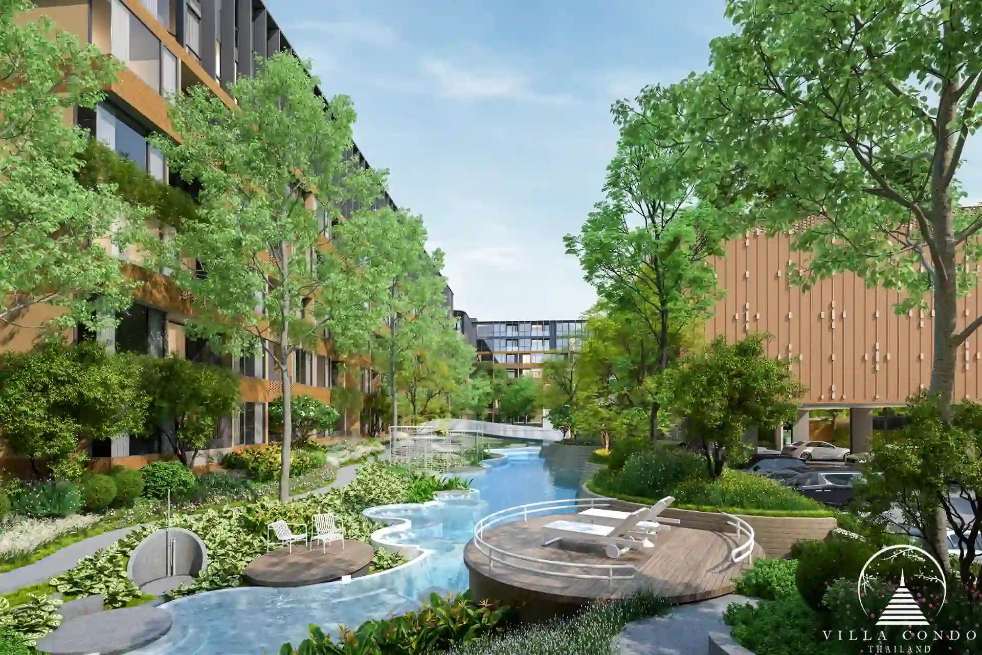 Arise Vibe condo poolside deck with loungers and trees in Thalang Phuket