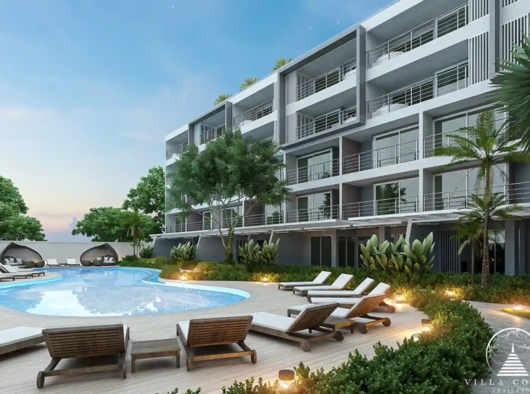 Babylon Sky Garden Phase 2 illuminated pool area with greenery in Rawai.