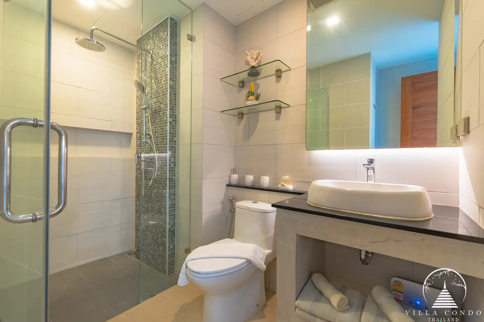 Babylon Sky Garden Phase 2 contemporary bathroom with glass shower in Rawai condo.
