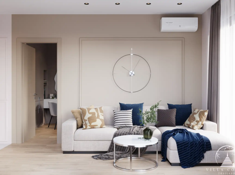 Dominion Rawai condo open-plan kitchen and living room with modern furniture in Phuket