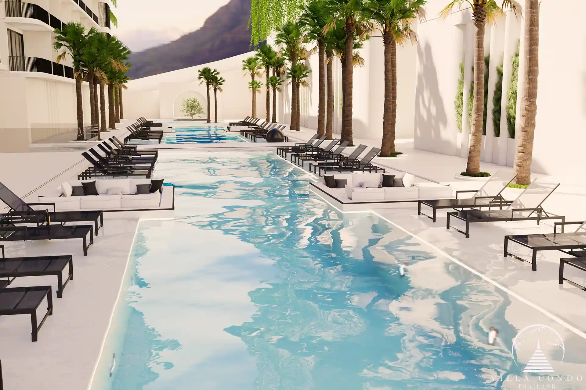Ever Prime Residences Karon double lap swimming pools with palm-lined deck