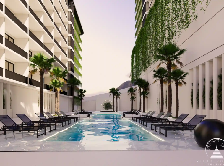 Ever Prime Residences Karon twin lap pools with palm-lined deck